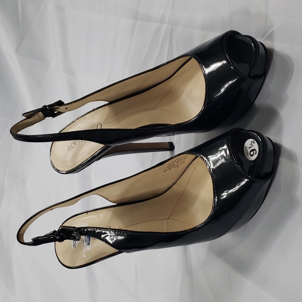 Black patent leather stiletto peep toe heels. Size 9 1/2